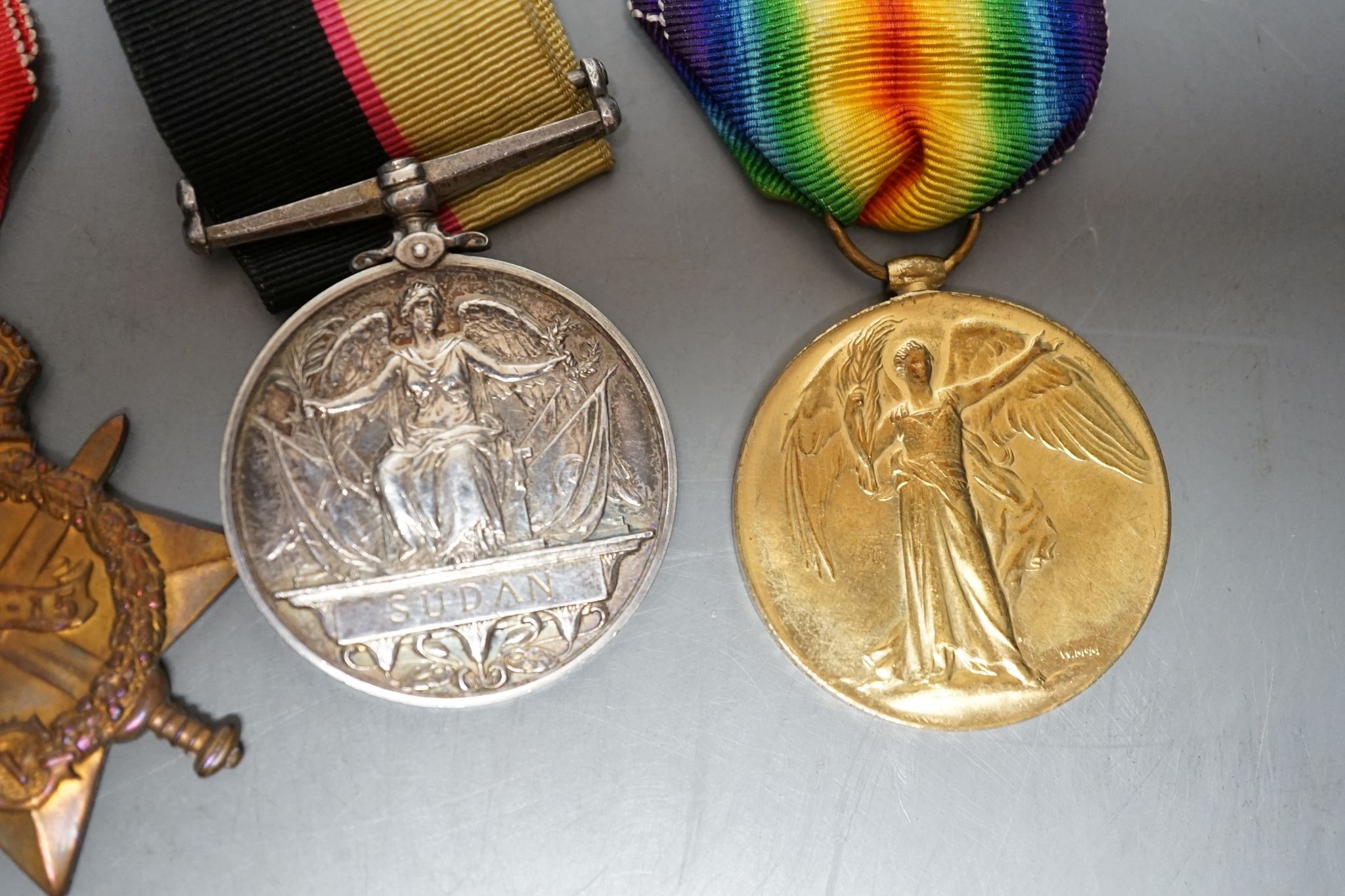 A medal trio awarded to Pte J Black, to include a Queen's Sudan, 1899